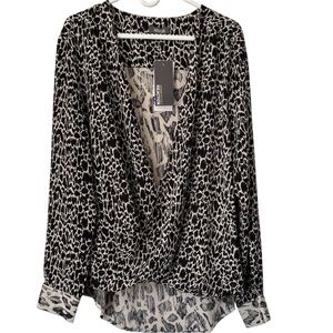 NWT Kenneth Cole Reaction plus size animal
Print blouse. Black and cream
